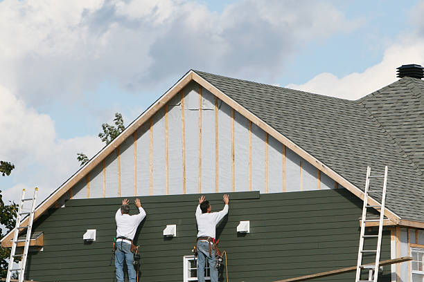 Professional Siding Contractor technician working in Katy, TX